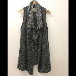 Sleeveless flutter front cardigan vest
